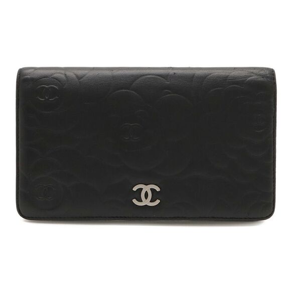 CHANEL Handbags - Chanel Camellia Embossed Leather Long Wallet